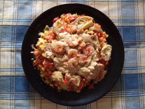 Ensalada aliñada de alcachofas y gambas